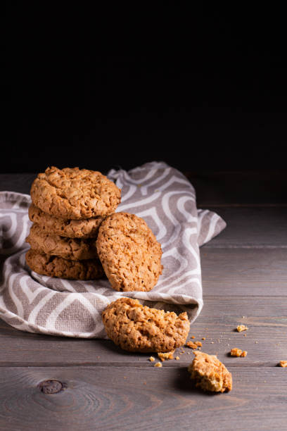 una pila di biscotti di farina d'avena - oat oatmeal isolated stack foto e immagini stock