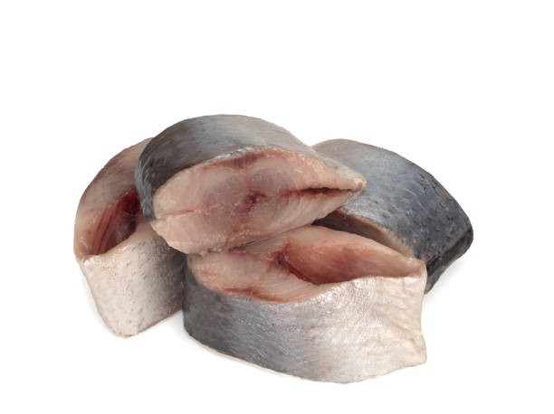 istock Lightly salted Norwegian herring, isolated on white background. 1314829043