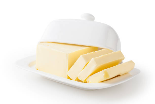 istock Fresh butter on white butter dish isolated on white background with clipping path 1314830678