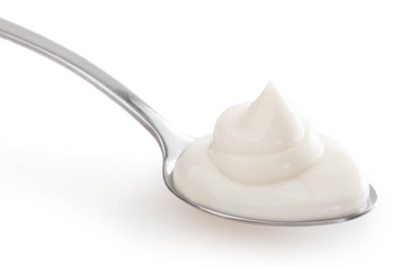 istock Spoon of mayonnaise isolated on white background with clipping path 1314830710