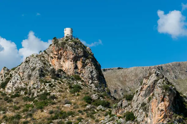 The so called Torre di Bennistra on a rock overlooking Scopello on Sicily.