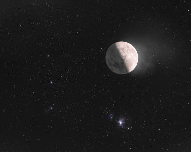 istock moon, stars and Orion constellation and nebula 1314835392