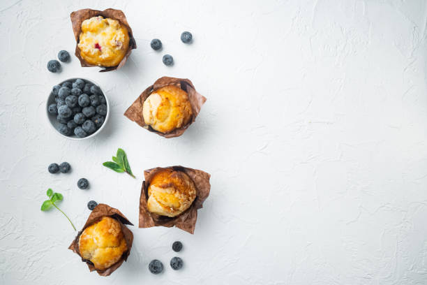 istock Muffin with blueberries, on white background, top view flat lay with copy space for text 1314836479