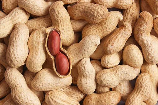 peanuts on a light background close-up. High quality photo
