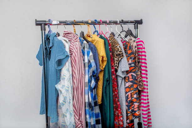 istock Various second-hand clothes from the wardrobe on the rack 1314842514
