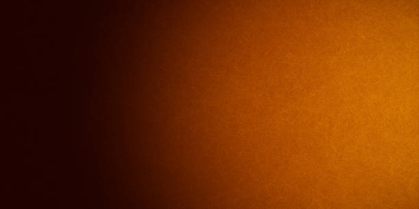 istock Horizontal yellow and orange grunge texture cement or concrete wall banner, blank background 1314843064