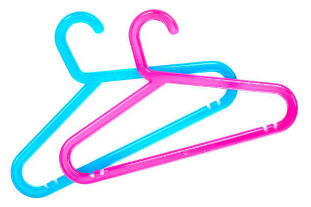 istock Colored plastic hangers isolated on white background. Storage and sales concept 1314844158