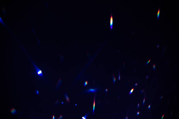 istock colorful warm rainbow crystal light leaks on black background 1314855448