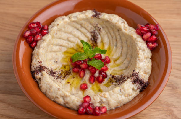 typical middle eastern ground eggplant dip known as mutabbal with pomegranate seeds. cold appetizer - eggplant dip baba ghanoush middle eastern cuisine imagens e fotografias de stock