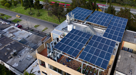 Building using solar panels as their source of energy in Bogota, Colombia - renewable energy concepts