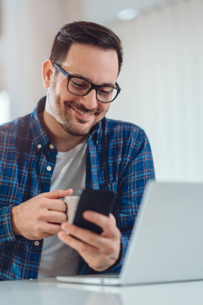 istock Businessman reading text messages on the smart phone 1314877343