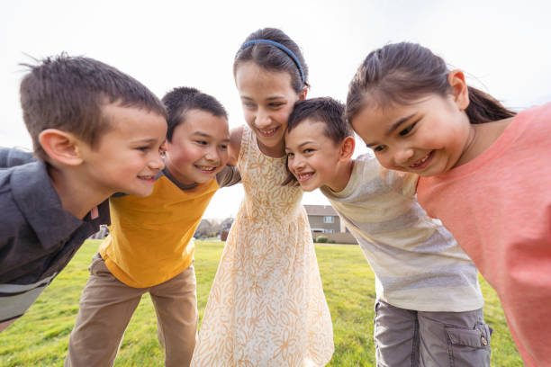 istock Happy group of friends playing together outside 1314878309