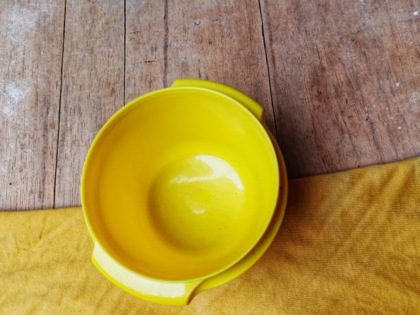 istock small plastic containers to store food in yellow 1314878940