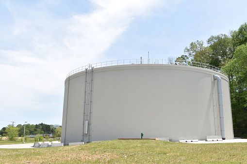 Large white municipal water storage tank