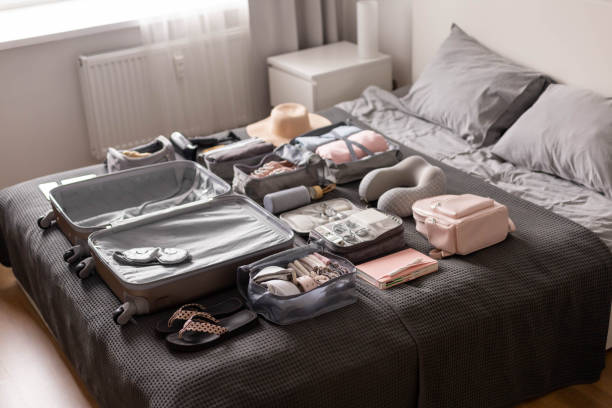 istock Organization of storage carrying necessary things in comfortable case with konmari method on bed 1314879767