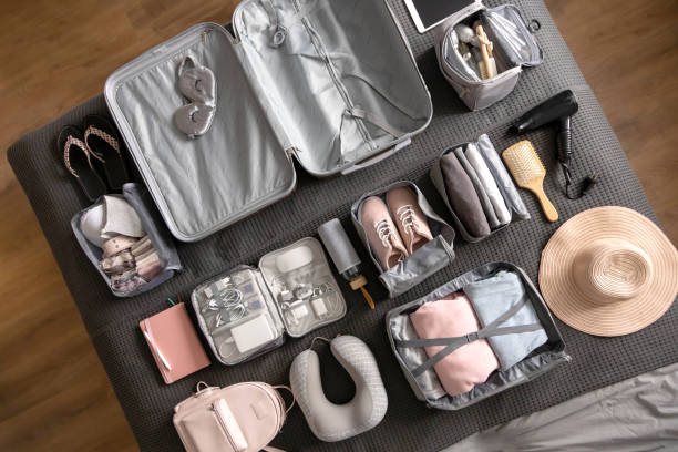istock Top view composition with neatly packing things, clothes and accessories for travel konmari method 1314880496