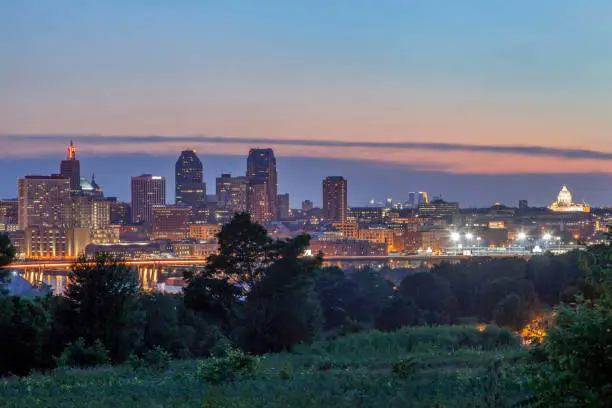 A Twilight Long Exposure Shot of the Downtown St. Paul and Distant Minneapolis Skylines and Minnesota State Capitol during a Summer Twilight