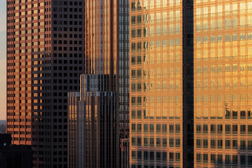 An Abstract Telephoto Close Up Detail Shot of Downtown Minneapolis Skyscrapers Reflecting Beautiful Warm Sunset Light