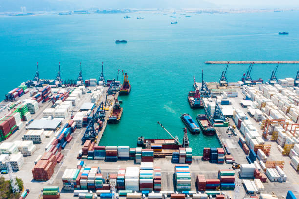 istock Cargo ship terminal, Unloading crane of cargo ship terminal, Industrial port with containers and container ship 1314889667