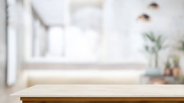 istock Copy space on marble table in blurred living room background 1314900364