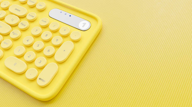istock Yellow pastel keyboard with round keys. 1314900450