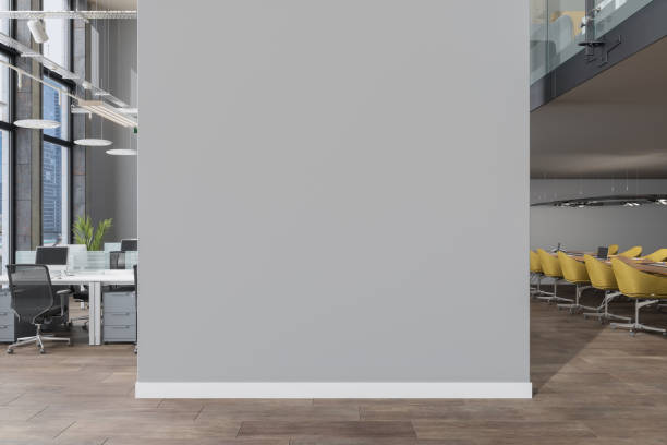 Modern Open Plan Office With Gray Blank Wall And Board Room With Yellow Chairs