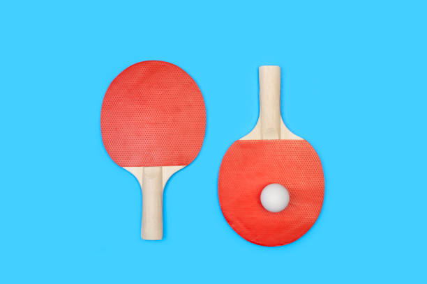 istock Red ping pong paddles and a white ball 1314903290