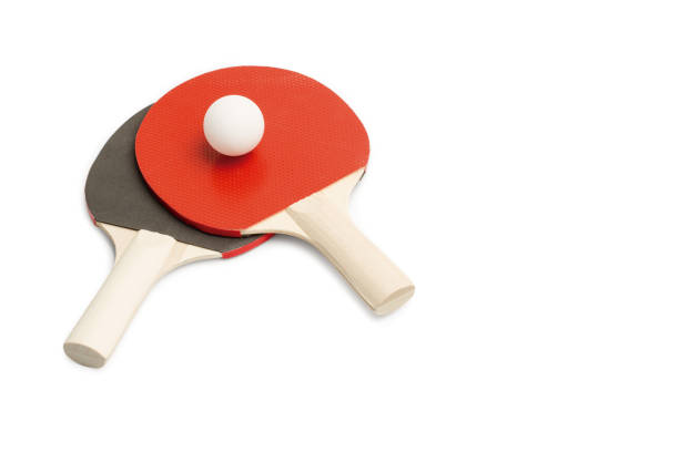 istock Red and black ping pong paddles with a white ball 1314903324