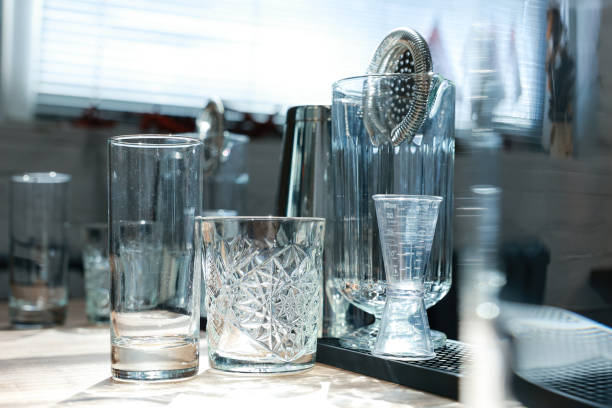 istock Glasses are arranged in a row on the bar counter. 1314906579