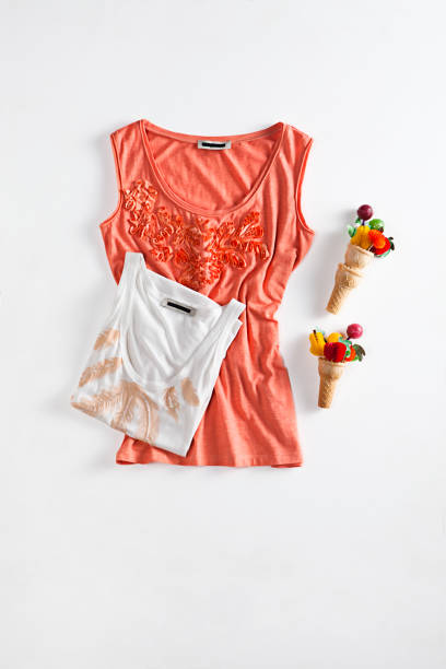 istock Sleeveless t-shirts with ice-cream on white background 1314906795
