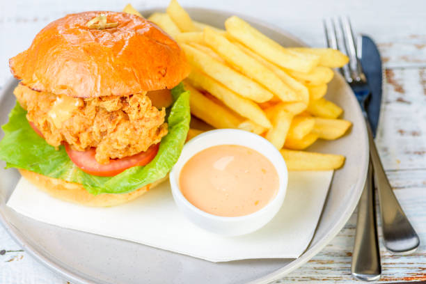 istock A fried chicken burger with lettuce and tomato 1314907485