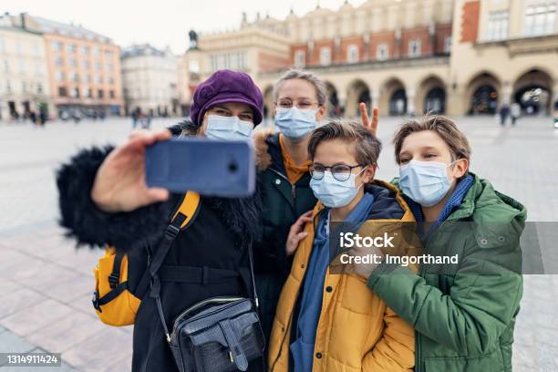 Family Sightseeing City During Covid19 Pandemic Stock Photo - Download Image Now - Poland, Coronavirus, Pandemic - Illness