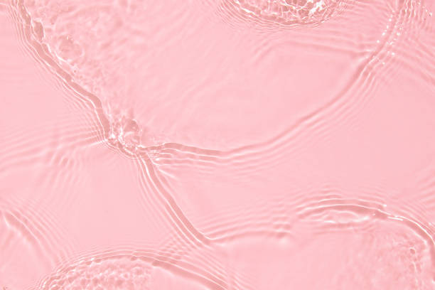 istock pink transparent clear water surface texture summer background 1314914997