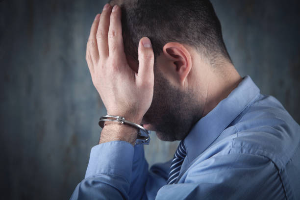 istock Caucasian businessman in handcuffs. Corruption 1314915247
