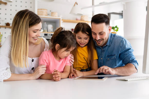 istock Happy family having fun time at home 1314917738