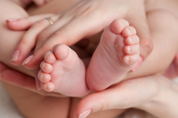 istock feet of a small child 1314918675