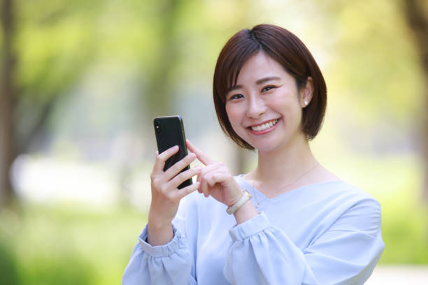 istock Female employee operating a smartphone 1314919634
