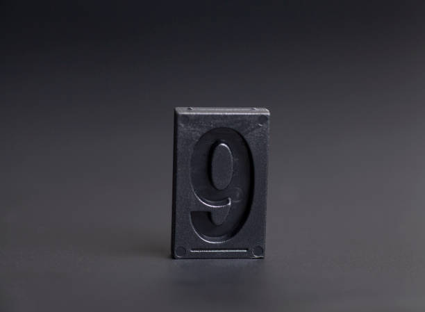 istock letterpress number nine on black background 1314919726