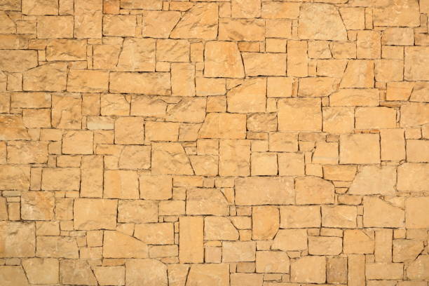 istock Background of decorate sand stone wall surface 1314920804