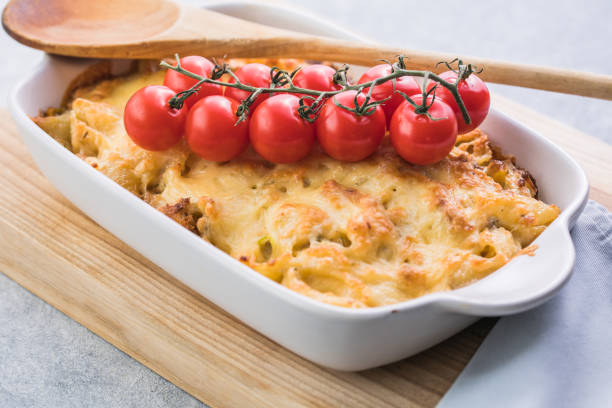 istock Tetrazzini -chicken pasta casserole in a baking dish with ingredients at background, american cuisine, view from above 1314923321