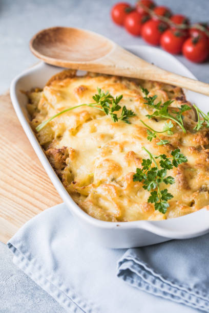 istock Tetrazzini -chicken pasta casserole in a baking dish with ingredients at background, american cuisine, view from above 1314923334