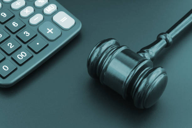 istock Judge gavel and calculator, arbitrage concept. 1314923816