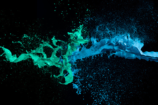 abstract liquid color splash on black background