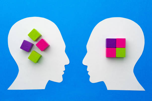 istock Papercut silhouette of human head with colorful constructor pieces 1314926073