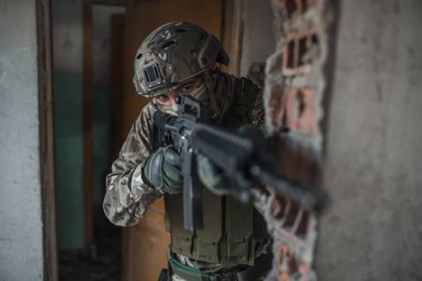 istock Special forces soldier in camouflage uniform fighting in conflict zone 1314926813