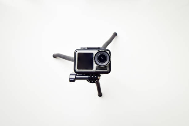 istock Action camera isolated on a white background with tripod looking up straight 1314926916