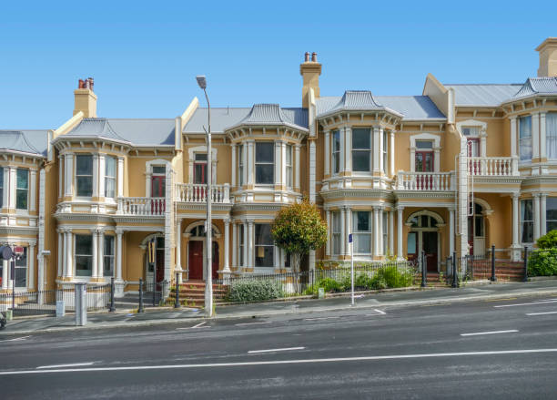Houses in Dunedin roadside scenery including some houses in Dunedin, a city at the South Island of New Zealand dunedin new zealand stock pictures, royalty-free photos & images