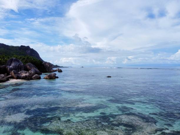 istock Seychelles - the Digue - beach cove source of money 1314933415