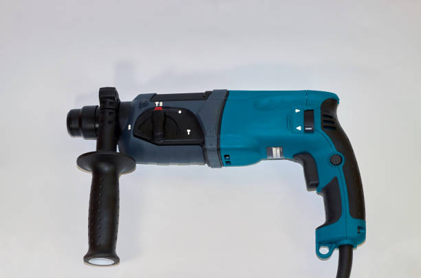 istock Professional punch for the job. Hammer drill for drilling in concrete, brick 1314933498