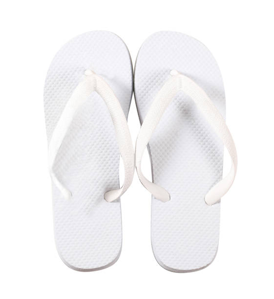 istock Pair of white plastic flip-flops on white background 1314936051